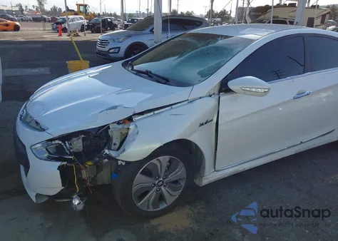 2014 Hyundai Sonata Hybrid Limited z USA, uszkodzony, nr VIN KMHEC4A42EA112124
